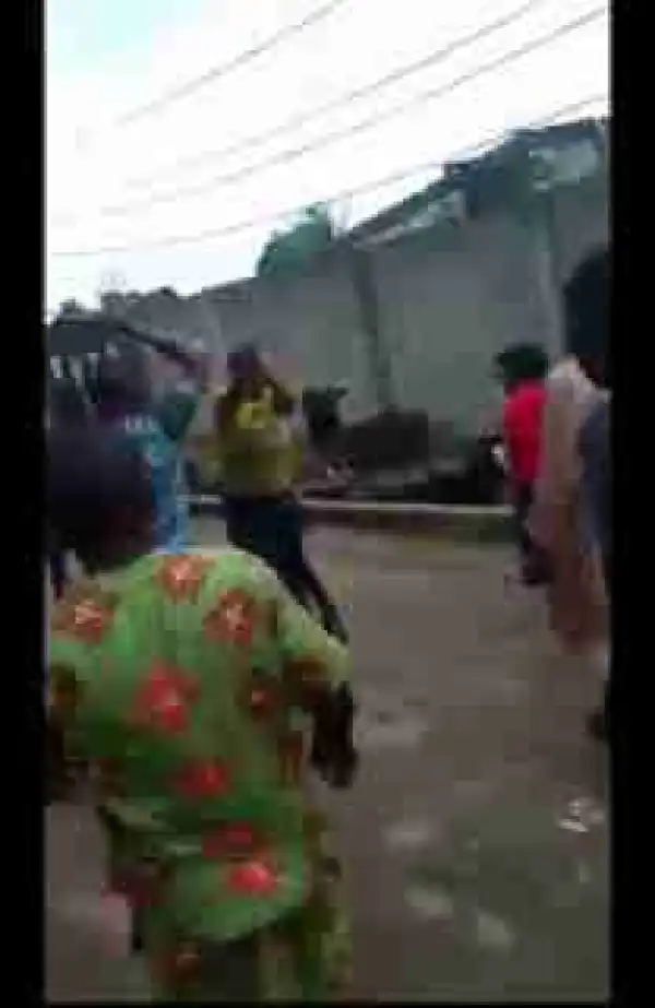 Female Child Kidnapper Caught In Lagos, Beaten & Disgraced By Mob (Photos)